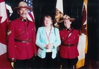 Dr. Rita Ross with RCMP officers